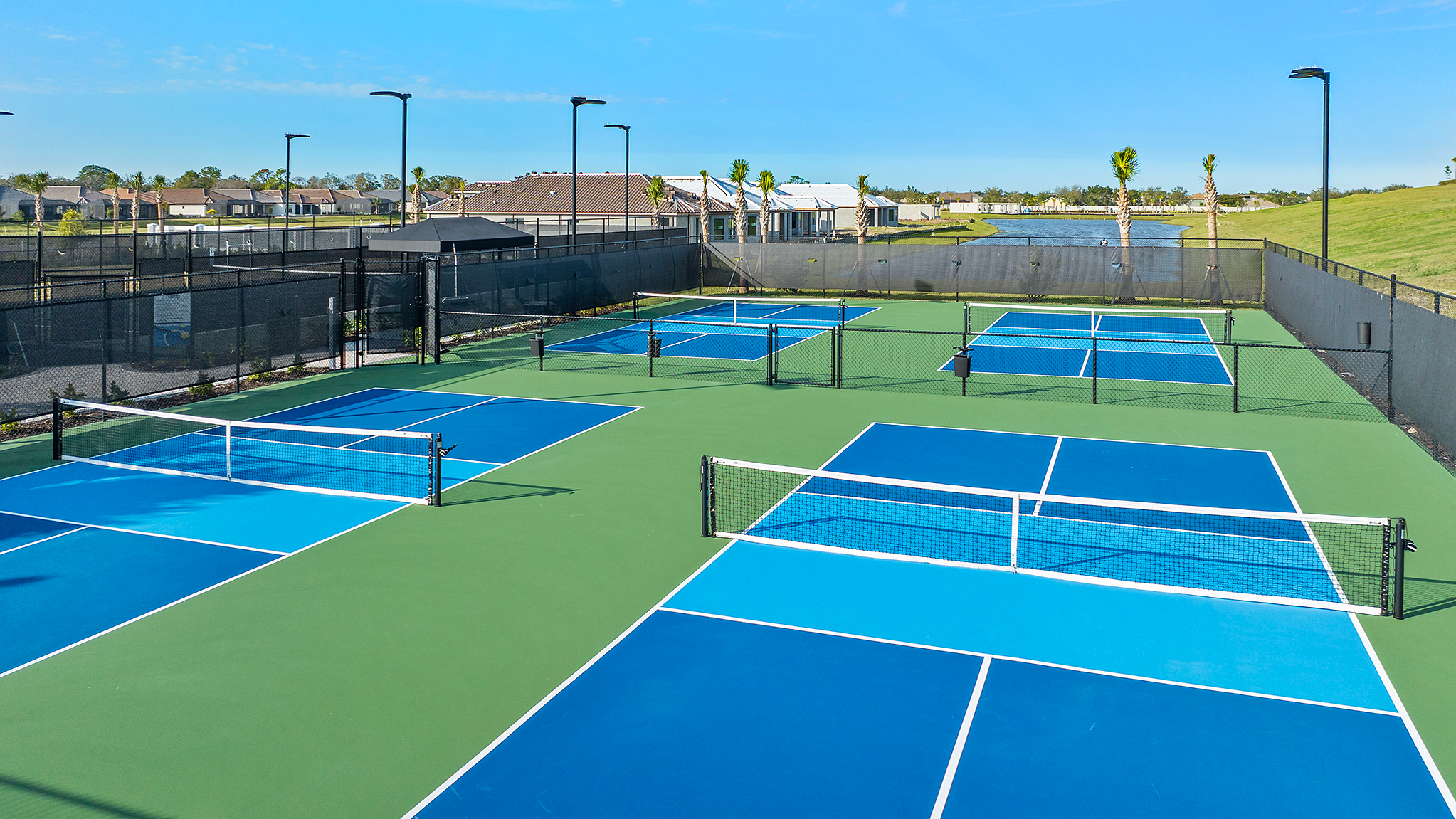 Pickleball and tennis courts at an Esplanade by Taylor Morrison community