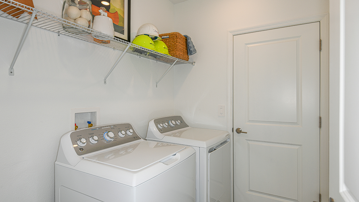 Magnolia Construction - Having storage in a laundry room is