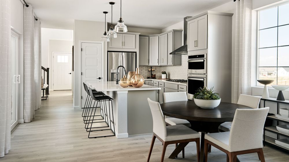 Taylor-Morrison-Aurora-Highlands-Stella-09-11-23-Dining-Kitchen-Web