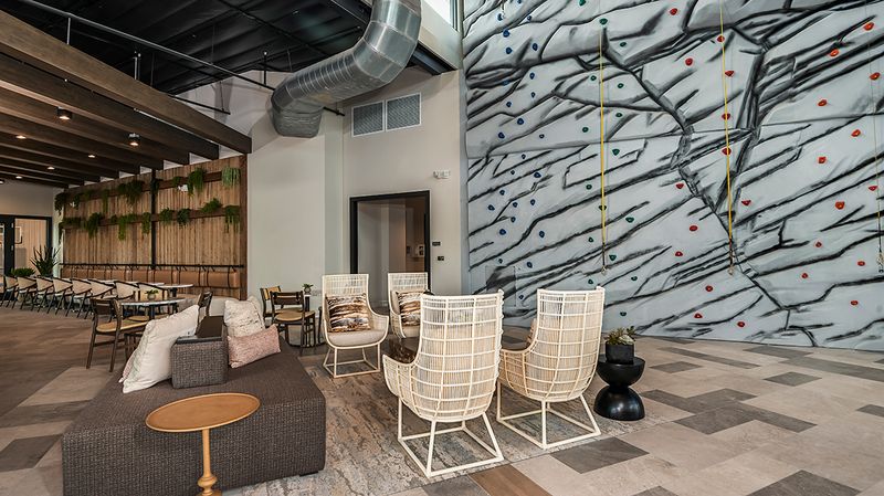 The-Hub-at-Skye-Ranch-3222-1200x675 - rock wall and sitting area