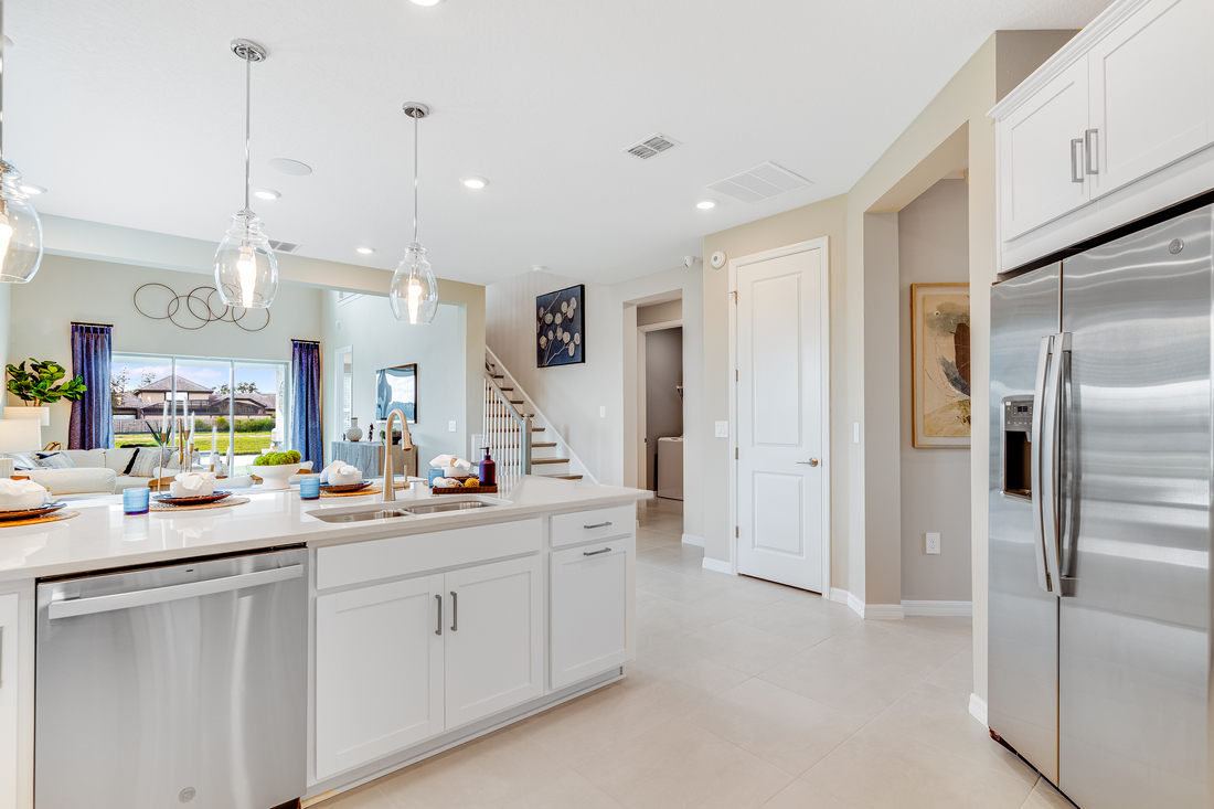 hj-fl-orlando-the-waters-at-center-lake-ranch-anastasia-1224teal-creek-kitchen-to-diningroom-02