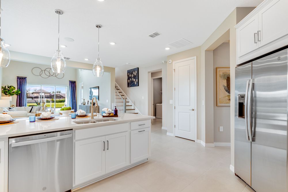 hj-fl-orlando-the-waters-at-center-lake-ranch-anastasia-1224teal-creek-kitchen-to-diningroom-02