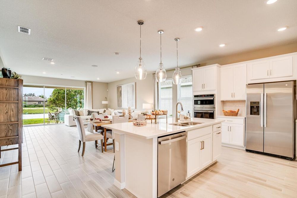 hj-fl-orlando-the-waters-at-center-lake-ranch-grenada-1218teal-creek-kitchen-to-diningroom-001