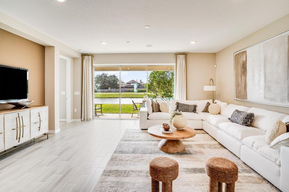 hj-fl-orlando-the-waters-at-center-lake-ranch-grenada-1218teal-creek-livingroom-to-back-patio-001