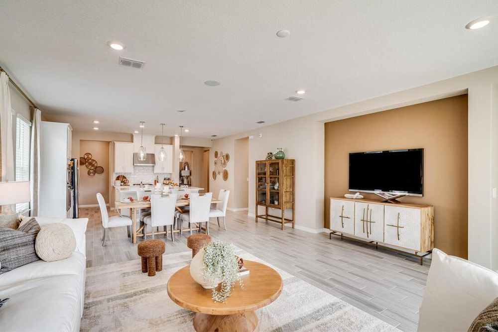 hj-fl-orlando-the-waters-at-center-lake-ranch-grenada-1218teal-creek-livingroom-to-dinningroom-001